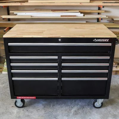 Mobile workbench with 9 drawers, hardwood top and power connection, 117 cm W x 62 cm D – high-gloss black