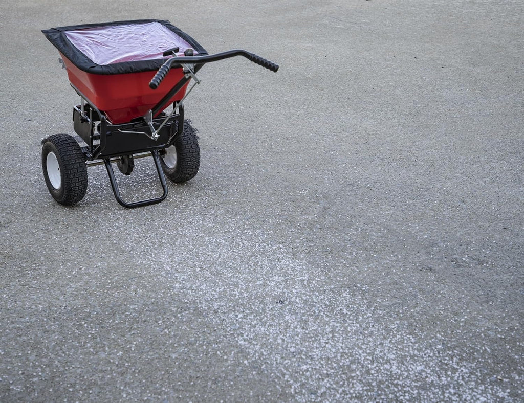 Multi-purpose push-along spreader, 100 lb capacity, versatile tool for lawn seed, salt, de-icer, fertilizer and seeds